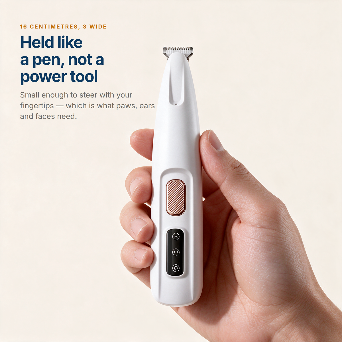The 16 centimetre trimmer held in a pen grip to show its compact size